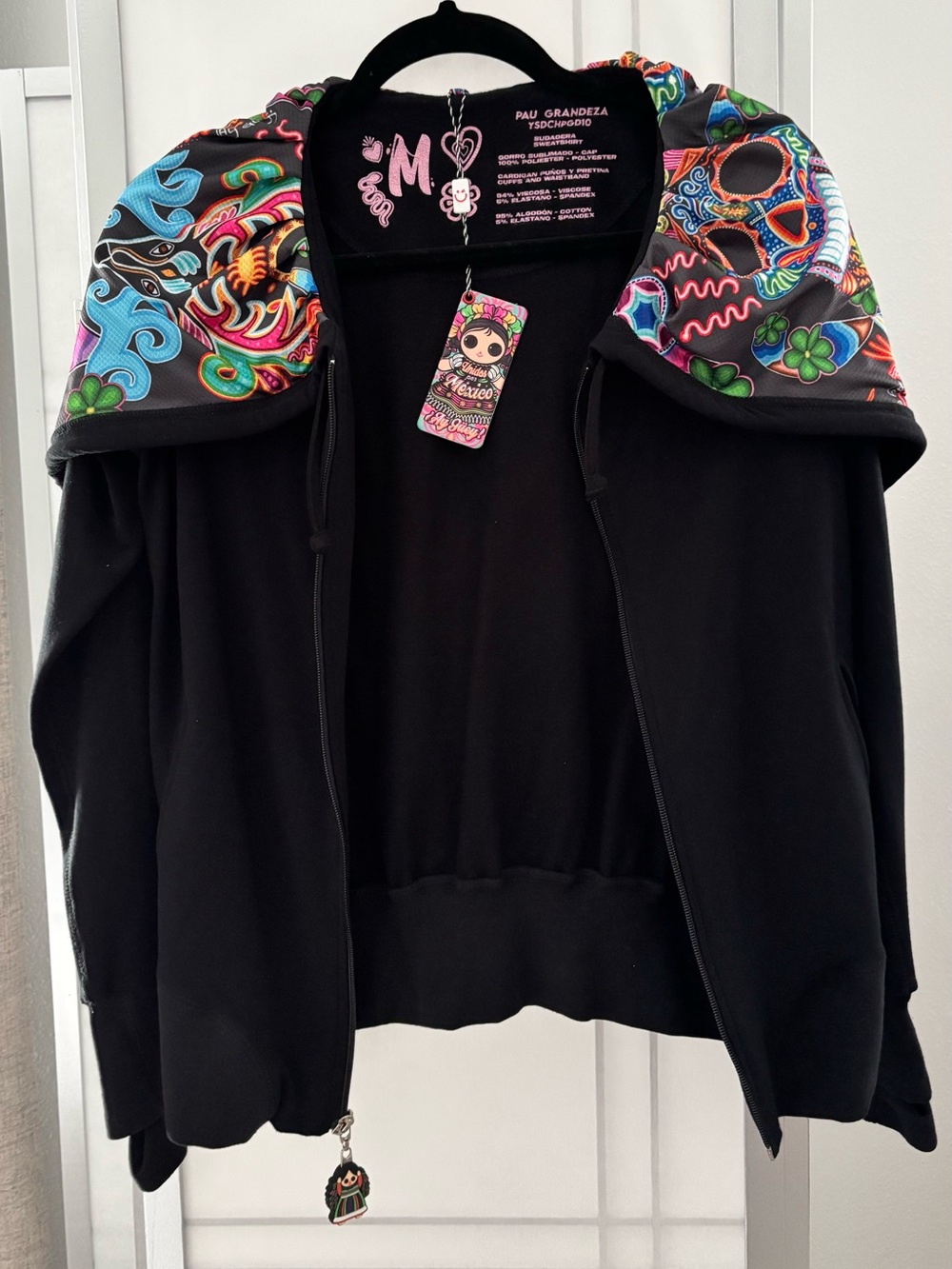 Ay Güey Mexican Convertible hoodie that transforms into a purse or backpack.